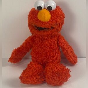 Tickle Me Elmo 2016 Laughs, Giggles, and Shakes Wiggles